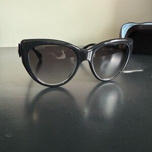 Gucci Black Cat-Eye Sunglasses with Glossy Finish